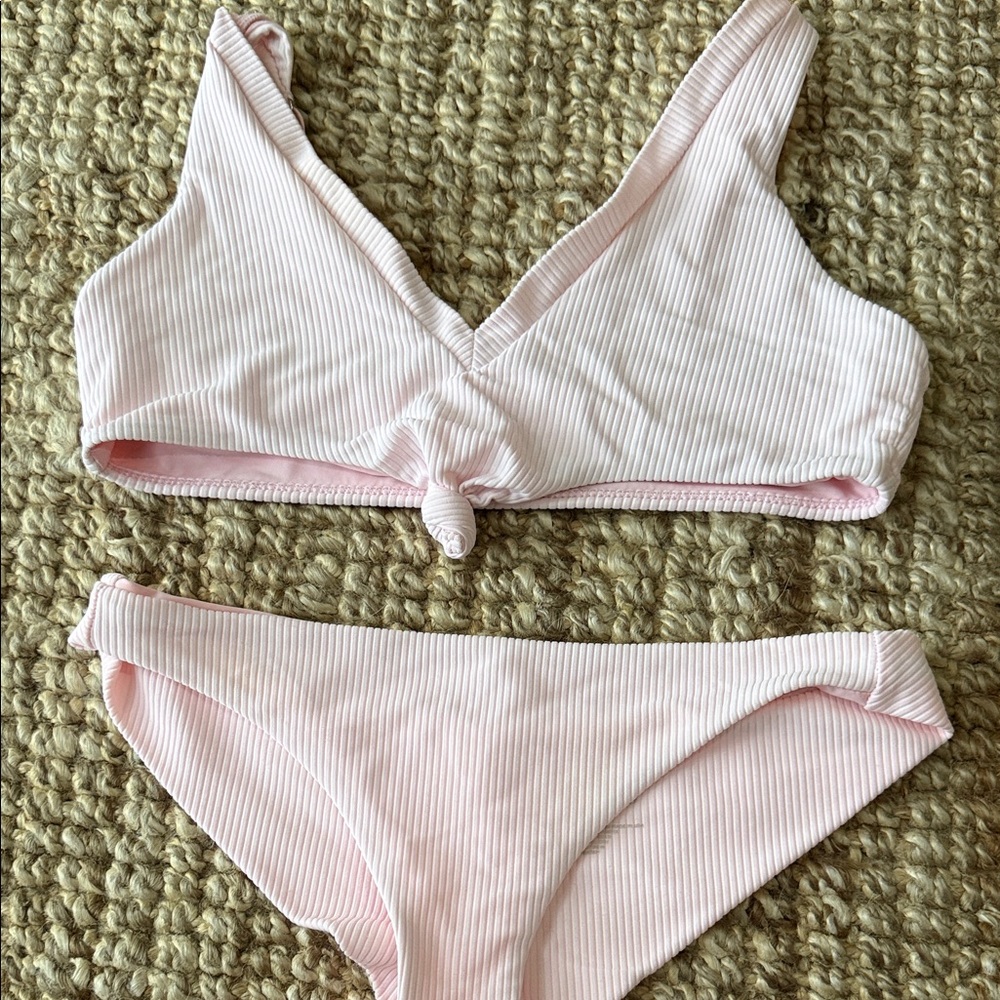 Frankie’s pink bikini.